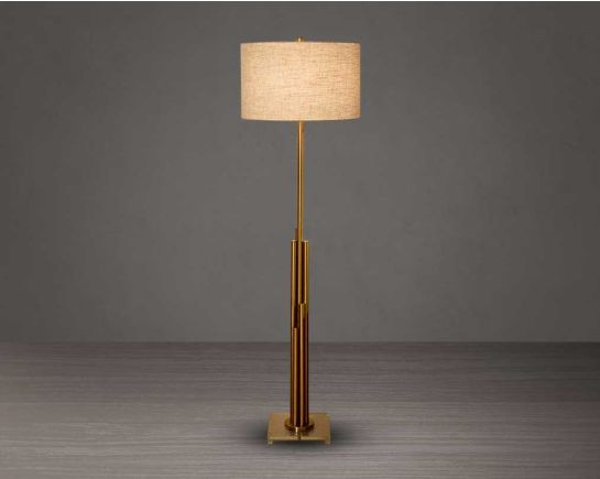 Art Décor floor lamp with multi-layered cylindrical bronze metal stand with a crystal base and a translucent fabric shade.