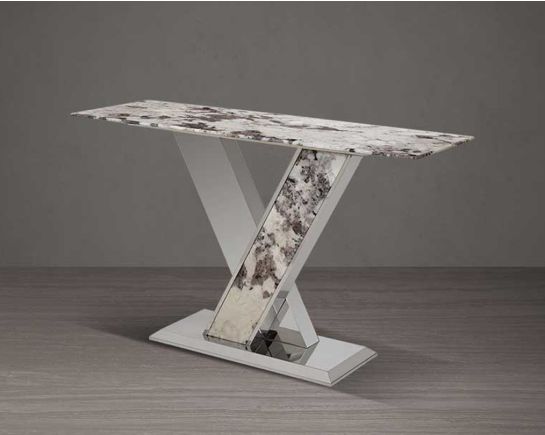 A stylish console with a natural white marble top and a glistening stainless steel crisscross base side view