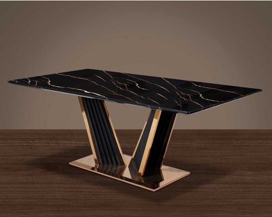 This glorious marble top dining table features a tree bark design motif finished in glossy rose gold plated stainless steel & black sandblasted base. It comfortably seats 6 people making an elegant & opulent style statement in any home