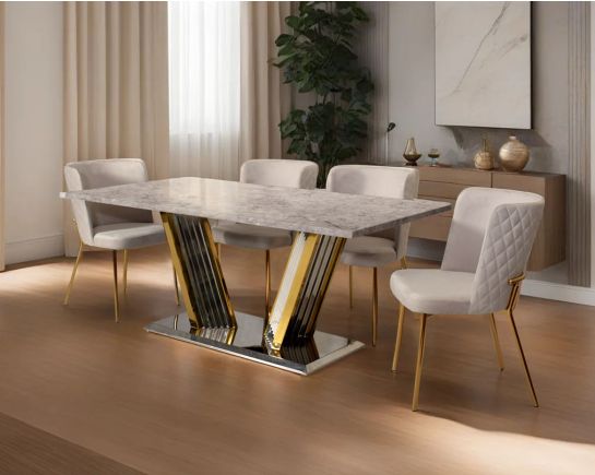 This glorious grey marble top dining table features a tree bark design motif and is crafted with a glossy gold-plated fluted stainless steel base. It makes for an opulent style statement to any home.

Minimalistically designed chair with criss-cross sti