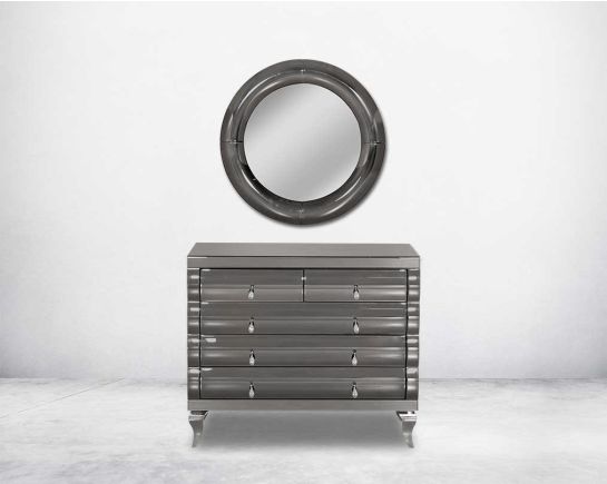 Chest of drawers in a grey curved mirror. Round wall mirror with grey curved mirror border in rich contemporary design.
