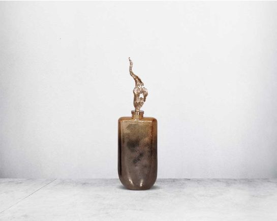 The modern decorative bottle features a champagne & leopard bronze mercury lustre glass with an ornamental antique gold plated aluminium lid. small