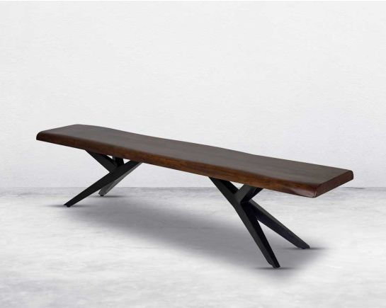 Exclusively designed bench in solid acacia wooden seat in dark walnut. This bench constitutes a black coated sturdy metal base. The quirky base underneath is a highlight of this bench.