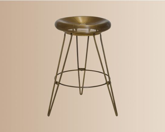 Metal bar stool finished in brass with a round wired metal seat giving it a luxe industrial look with versatility to suit any style.