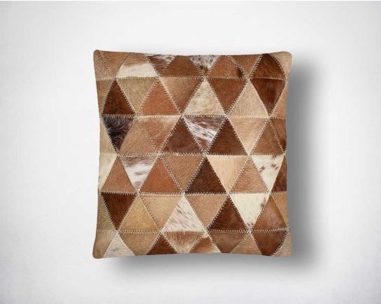 Brown and tan hair on the leather cushion.