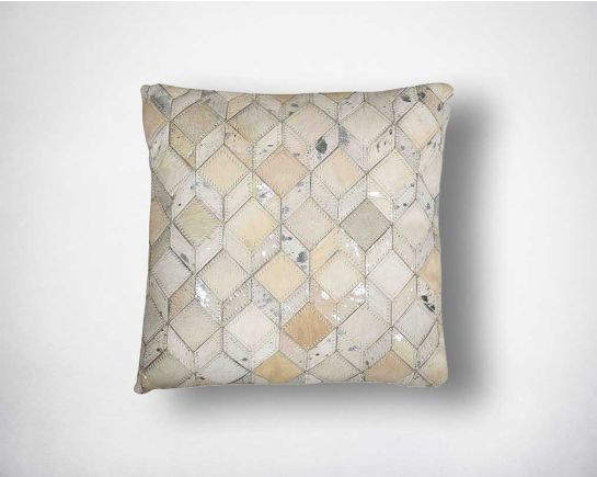 White and silver hair on the leather cushion.