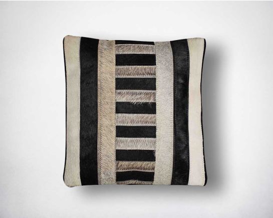 White, black & grey hair on the leather cushion.