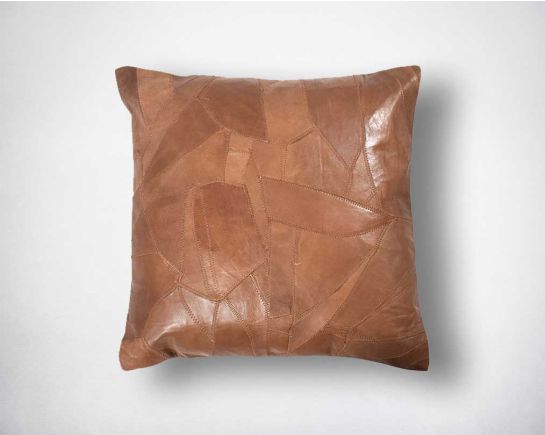 Patched sheep napa cushion.