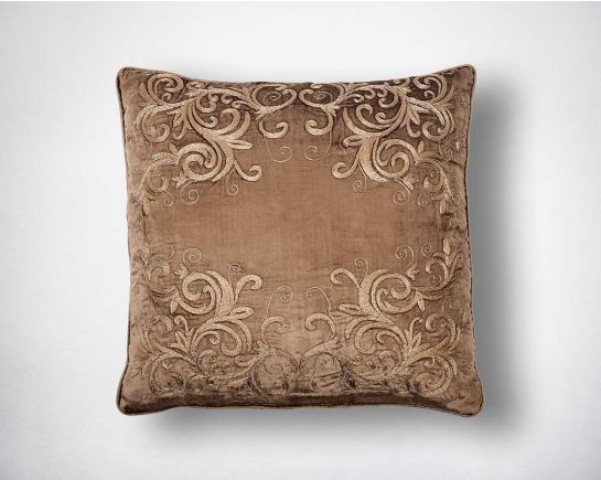 Gold embroidered poly silk cushion.